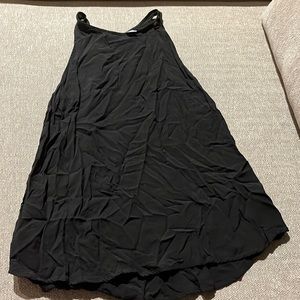 Black sleeveless blouse with halter style neck line